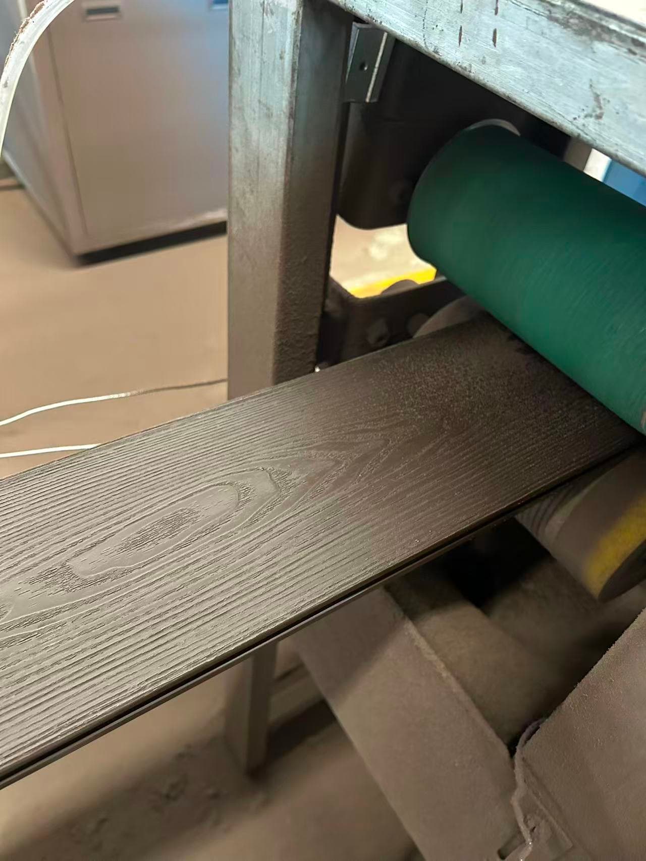 Close-up of brushed surface processing on outdoor WPC wall panels
