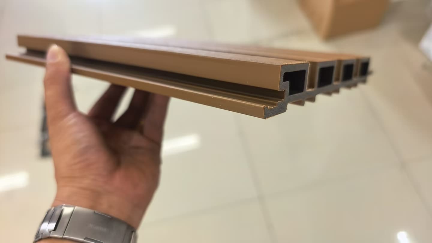 Outdoor WPC wall panel profile with a wood-look surface