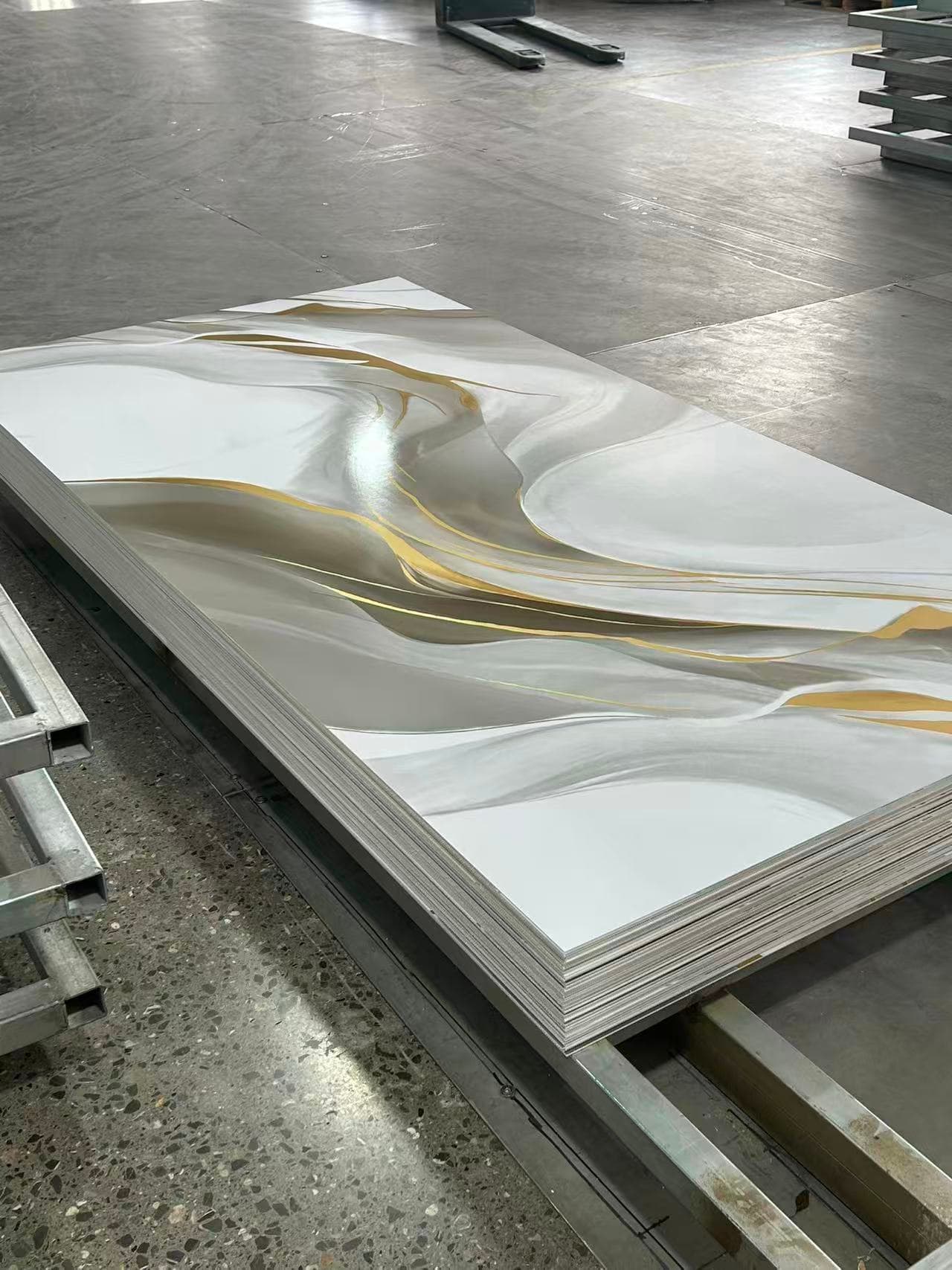 Stacked UV marble sheets with a marble-effect surface